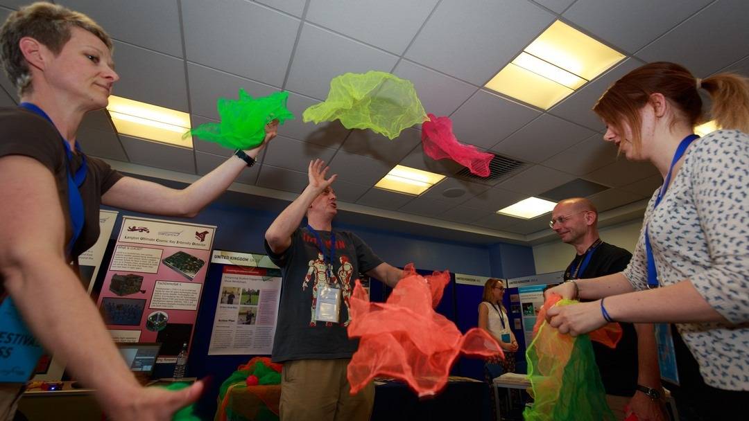 Adult Juggling Workshop Science on Stage Festival London 2015 A group of Teachers learn to juggle with scarves and explore how air resistance really helps as the objects fall a lot slower.